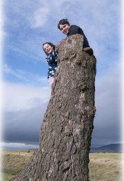 Children perched on the lookout stump